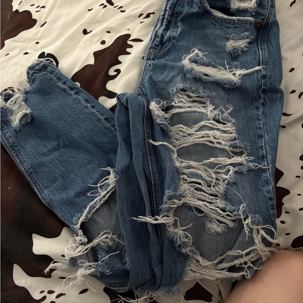 Distressed Blue Jeans
